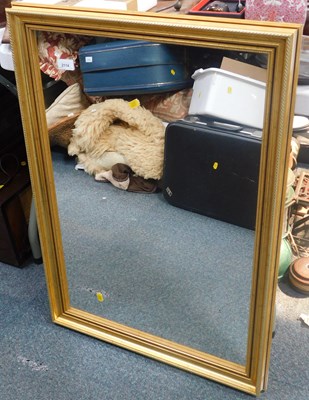 Lot 2114 - A large rectangular gilt framed mirror.