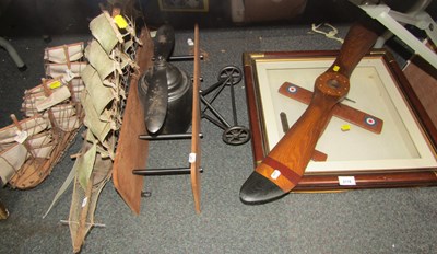 Lot 2119 - A small model aeroplane propeller, a framed...