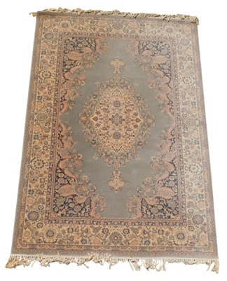 Lot 699 - A Turkish rug, pale blue ground, the central...