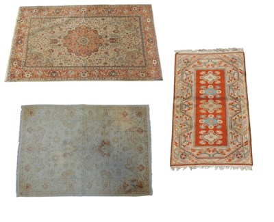 Lot 700 - A Tabriz wool and silk rug, cream ground with...