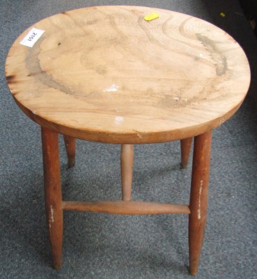 Lot 2151 - A hardwood stool, with turned supports joined...