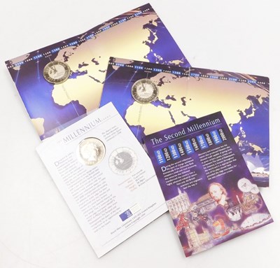 Lot 2232 - Three £5 Millennium coins, carded.