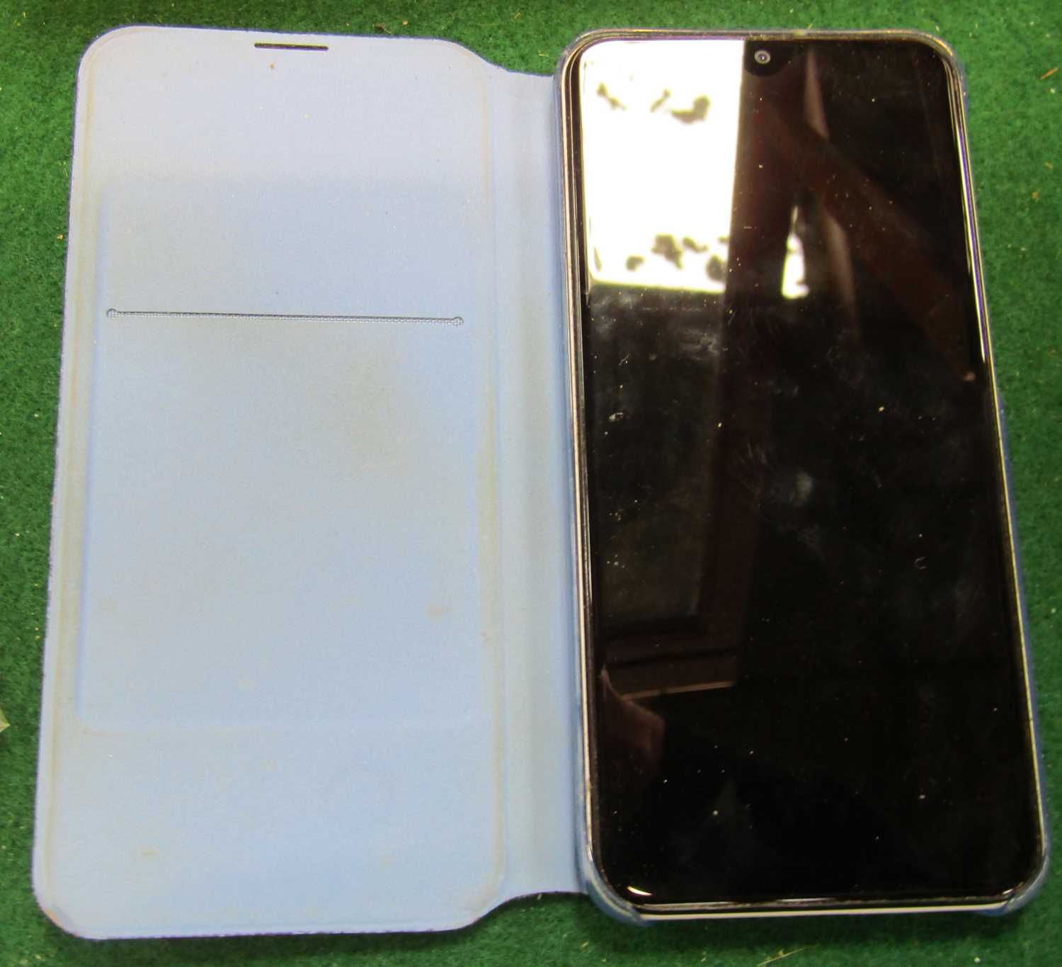 Lot 2177 - A Samsung mobile phone, in case.