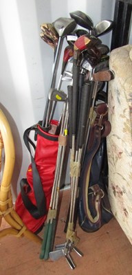 Lot 1090A - Two golf bags and a quantity of golf clubs.