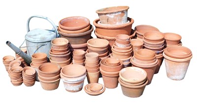 Lot 272 - A large quantity of terracotta flower pots,...