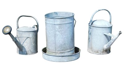 Lot 279 - A galvanised two-gallon belldray watering...