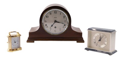 Lot 113 - A mahogany cased mantel clock, the silvered...