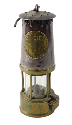Lot 130 - A brass and steel protector 117 miner's lamp,...