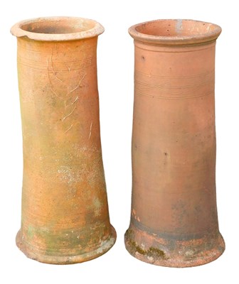Lot 284 - A pair of terracotta chimney pots, 82cm high.