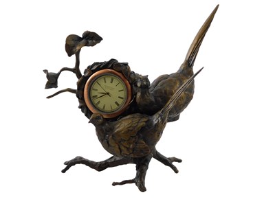 Lot 138 - A Richard Cooper & Company bronze clock...