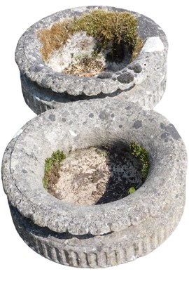 Lot 292 - A pair of circular concrete planters,...