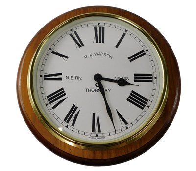 Lot 146 - A stained pine wall clock, the dial stamped BA...