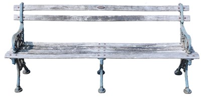 Lot 299 - A garden bench, cast iron supports and wooden...