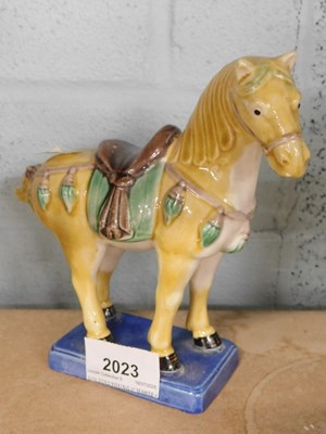 Lot 2023 - A late Chinese souvenir model of a tang horse,...