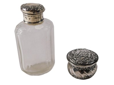 Lot 328 - A Victorian silver pill box, with embossed...