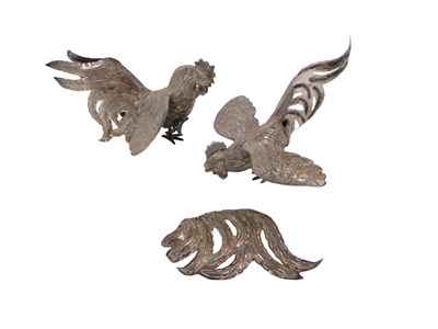 Lot 350 - A pair of Peruvian white metal models of...