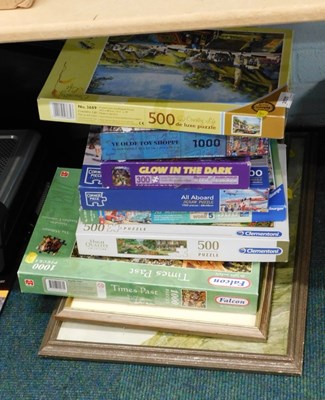 Lot 2035 - A quantity of jigsaw puzzles and framed prints,...