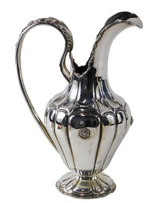 Lot 376 - A Peruvian white metal jug or ewer, with...