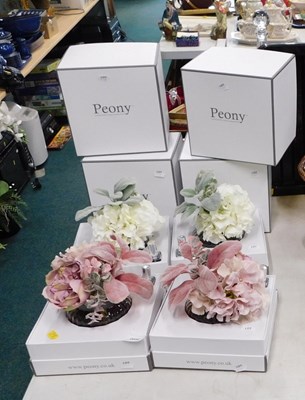 Lot 2040 - A group of four Peeley artificial flower...