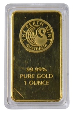Lot 504 - A gold plated Ingot stamped 99.99% pure gold...