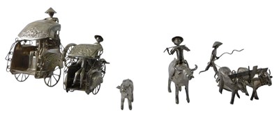 Lot 380 - A silver coloured metal Asian rickshaw, and...