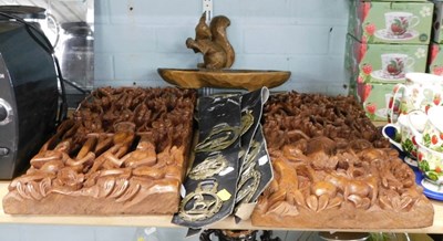 Lot 2016 - A carved wooden nut bowl, with carved wooden...