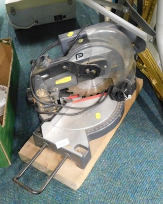 Lot 2082 - A 210mm bench mounted mitre saw.