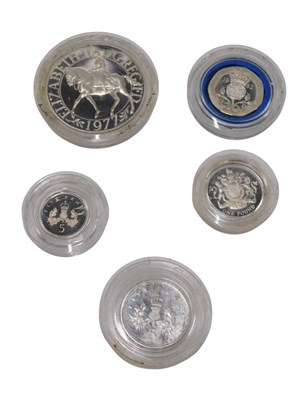Lot 409 - A collection of silver coins, to include 1977...