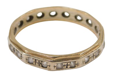 Lot 63 - A 9ct two colour gold and CZ full eternity...