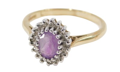 Lot 45 - A 9ct gold amethyst and diamond ring, the over...