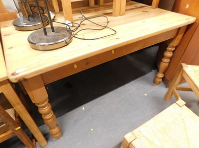 Lot 1503 - A 20thC pine dining table, the rectangular top...