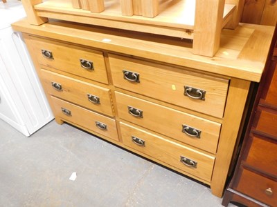 Lot 1505 - A contemporary light oak chest, the...