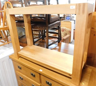 Lot 1507 - A contemporary light oak two tier side table,...