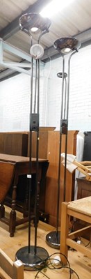 Lot 1540 - A pair of chromed uplighter standard lamps.