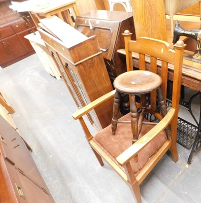Lot 1518 - An elm stool, the circular top raised on...