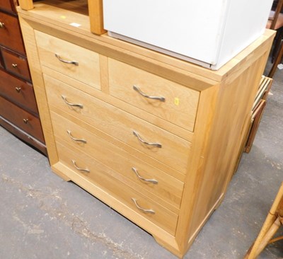 Lot 1553 - A contemporary oak chest, of two short over...