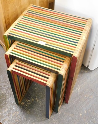 Lot 1565 - A nest of three tables, of slatted form, each...