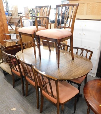 Lot 1571 - An extending twin pedestal mahogany dining...