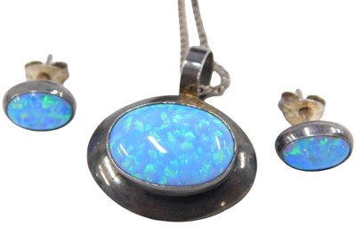 Lot 314 - An Arts & Crafts style silver and opal pendant...