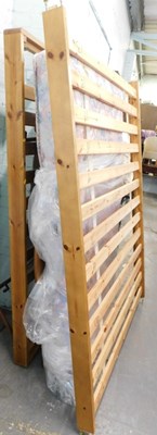 Lot 1623 - A pine single bed frame, comprising headboard,...