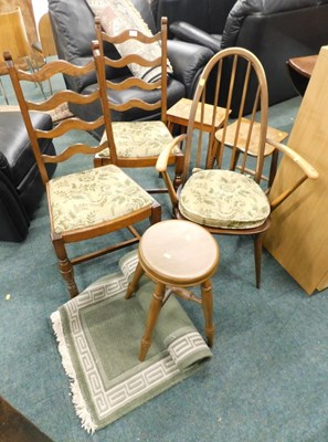 Lot 1628 - An Ercol dark elm dining chair, with loose...