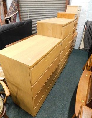 Lot 1629 - Two multidrawer chests, together with an oak...