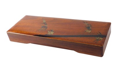 Lot 555 - A Chinese camphorwood box, decorated with bamboo.