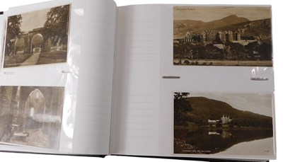 Lot 562 - Deltiology. Postcards, an album of 20thC...