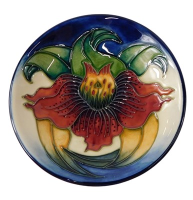 Lot 564 - A Moorcroft pottery Lily pattern pin dish,...
