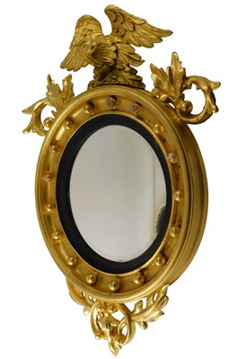 Lot 584 - A Regency giltwood and gesso wall mirror, with...