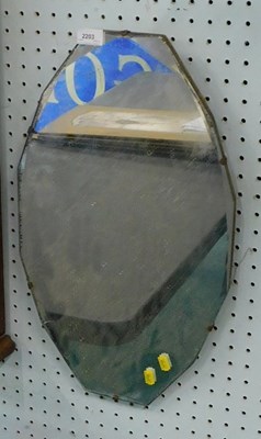 Lot 2203 - A bevelled wall mirror, 33cm x 54cm.