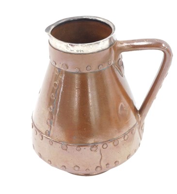 Lot 638 - A Doulton Siliconware jug, decorated to...