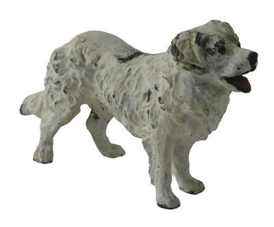 Lot 721 - A 20thC painted cast metal model of a dog, 8cm...