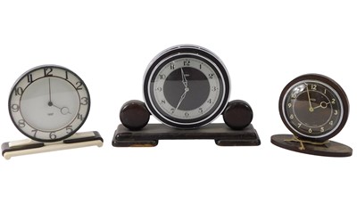 Lot 723 - Three mid century mantel clocks, comprising...